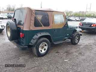 1999 Jeep Wrangler SE with VIN 1J4FY29P9XP467850, listed as a IAAI auction lot 42029322 with 250,884 mi miles. Bid and sale history available at carsss.com. Image 4.