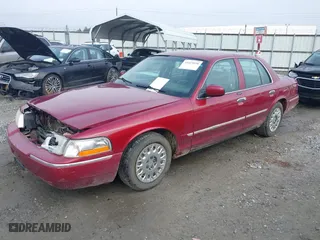2003 Mercury Grand Marquis GS Convenience with VIN 2MEFM74W33X705854, listed as a IAAI auction lot 41619958 with 149,356 mi miles. Bid and sale history available at carsss.com. Image 17.
