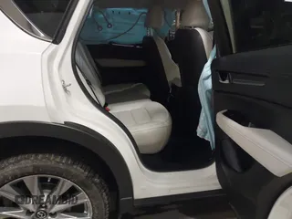 2020 Mazda CX-5 Grand Touring with VIN JM3KFBDM6L1828611, listed as a IAAI auction lot 42006976 with 59,939 mi miles and . Bid and sale history available at DreamBid. Image 8.