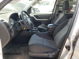 2007 Ford Escape XLS z VIN 1FMYU02Z97KC06172, wystawiony jako Copart lot #56978575 z przebiegiem 155 456 mil mil oraz Szkoda całkowita • Salvage title. Historia ofert i sprzedaży dostępna na DreamBid. Obrazek 7.