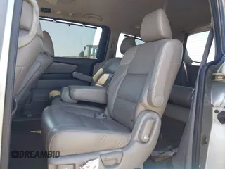 2014 Honda Odyssey Touring with VIN 5FNRL5H91EB068427, listed as a IAAI auction lot 42163315 with 184,134 mi miles and . Bid and sale history available at DreamBid. Image 8.