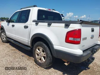 2007 Ford Explorer Sport Trac XLT z VIN 1FMEU31K17UA04200, wystawiony jako IAAI lot #42733514 z przebiegiem 180 899 mil mil oraz . Historia ofert i sprzedaży dostępna na DreamBid. Obrazek 3.