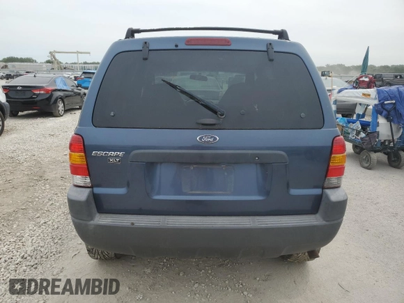 2001 Ford Escape XLT with VIN 1FMYU03131KF10968, listed as a Copart auction lot 67849474 with 197,328 mi miles and Salvage Title. Bid and sale history available at carsss.com. Image 6.