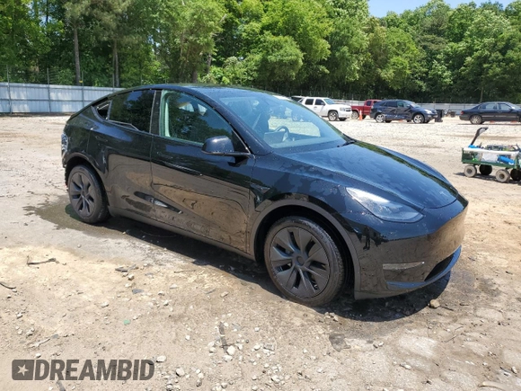 2024 Tesla Model Y z VIN 7SAYGDED2RA329802, wystawiony jako Copart lot #57748805 z przebiegiem 19 391 mil mil oraz Szkoda całkowita • Salvage title. Historia ofert i sprzedaży dostępna na DreamBid. Obrazek 4.