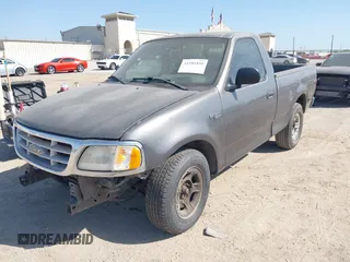 2003 Ford F-150 XL with VIN 1FTRF17273NB64646, listed as a IAAI auction lot 41986850 with 180,601 mi miles. Bid and sale history available at carsss.com. Image 2.