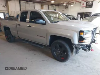 2017 Chevrolet Silverado 1500 LT with VIN 1GCVKREC5HZ252129, listed as a IAAI auction lot 41527539 with 135,982 mi miles. Bid and sale history available at carsss.com. Image 1.