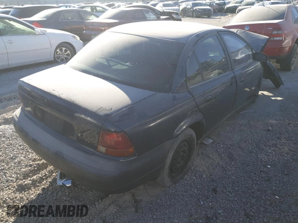1999 Saturn SL with VIN 1G8ZH5289XZ336486, listed as a Copart auction lot 83240394 with Not Provided miles and Non Repairable. Bid and sale history available at carsss.com. Image 3.