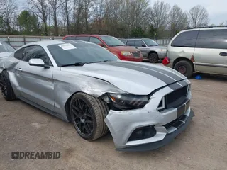 2015 Ford Mustang EcoBoost with VIN 1FA6P8TH9F5373917, listed as a IAAI auction lot 41932118 with 70,541 mi miles and . Bid and sale history available at carsss.com. Image 1.