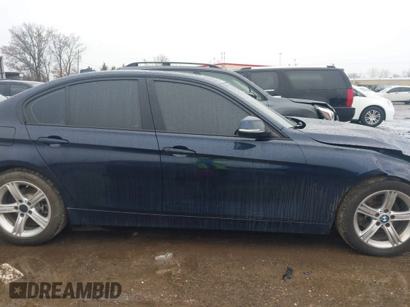 2015 BMW 3 Series 320i xDrive with VIN WBA3C3C57FP664631, listed as a IAAI auction lot 41117730 with 102,555 mi miles and . Bid and sale history available at DreamBid. Image 13.