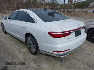2019 Audi A8 L with VIN WAU8DAF83KN007358, listed as a IAAI auction lot 41540352 with 77,203 mi miles. Bid and sale history available at carsss.com. Image 3.