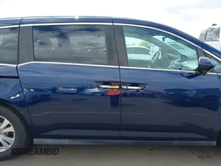 2017 Honda Odyssey SE with VIN 5FNRL5H30HB025472, listed as a IAAI auction lot 42212081 with 33,557 mi miles and . Bid and sale history available at carsss.com. Image 14.