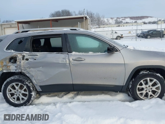 2018 Jeep Cherokee Latitude Plus with VIN 1C4PJMLB1JD502431, listed as a IAAI auction lot 41292612 with 115,839 mi miles and . Bid and sale history available at DreamBid. Image 13.