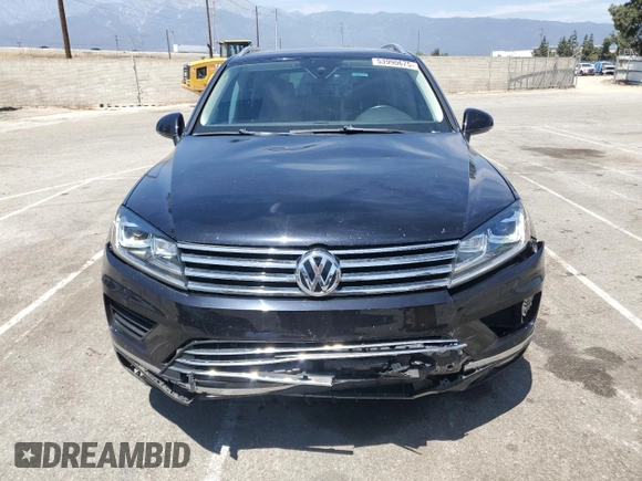 2016 Volkswagen Touareg Sport with VIN WVGEF9BP0GD007399, listed as a Copart auction lot 53990675 with 110,439 mi miles and Salvage Title. Bid and sale history available at DreamBid. Image 5.