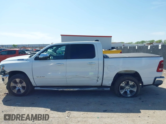 2023 Ram 1500 Laramie with VIN 1C6SRFJT0PN508550, listed as a IAAI auction lot 41913849 with 57,765 mi miles and . Bid and sale history available at DreamBid. Image 14.
