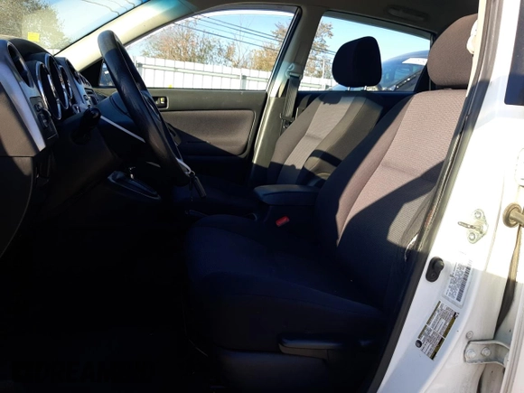 2005 Pontiac Vibe with VIN 5Y2SL638X5Z417374, listed as a Copart auction lot 77536904 with 299,999 mi miles and Salvage Title. Bid and sale history available at DreamBid. Image 7.