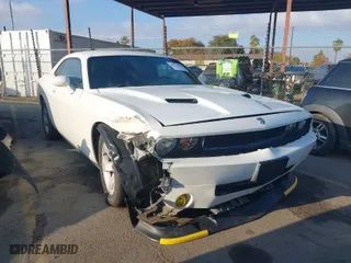 2010 Dodge Challenger SE with VIN 2B3CJ4DV8AH129688, listed as a IAAI auction lot 40976328 with 207,706 mi miles. Bid and sale history available at carsss.com. Image 1.