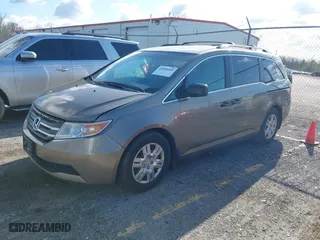 2012 Honda Odyssey LX with VIN 5FNRL5H29CB091860, listed as a IAAI auction lot 42000688 with 295,551 mi miles. Bid and sale history available at carsss.com. Image 17.