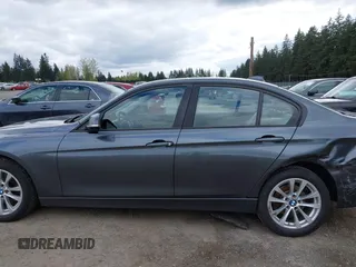 2018 BMW 3 Series 320i xDrive with VIN WBA8E5G53JNV03333, listed as a IAAI auction lot 42018275 with 45,950 mi miles. Bid and sale history available at carsss.com. Image 14.