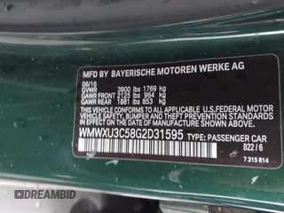 2016 MINI Cooper Hardtop 4 Door S with VIN WMWXU3C58G2D31595, listed as a IAAI auction lot 41267547 with 145,191 mi miles. Bid and sale history available at carsss.com. Image 9.