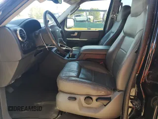 2003 Ford Expedition Special Service with VIN 1FMFU16L83LC58206, listed as a Copart auction lot 57591205 with 184,133 mi miles and Salvage title. Bid and sale history available at DreamBid. Image 7.
