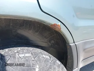 2005 Ford Escape XLS Value z VIN 1FMYU92Z75DA03268, wystawiony jako IAAI lot #42051311 z przebiegiem 124 985 mil mil oraz . Historia ofert i sprzedaży dostępna na DreamBid. Obrazek 6.