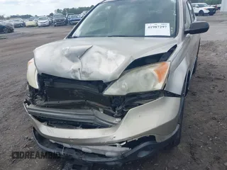 2007 Honda CR-V EX with VIN JHLRE38567C054005, listed as a IAAI auction lot 41987297 with 206,145 mi miles and . Bid and sale history available at carsss.com. Image 6.