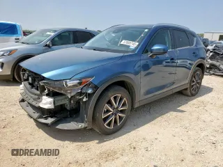 2018 Mazda CX-5 Touring z VIN JM3KFACM5J1419816, wystawiony jako Copart lot #57685745 z przebiegiem 71 999 mil mil oraz Szkoda całkowita • Salvage title. Historia ofert i sprzedaży dostępna na DreamBid. Obrazek 1.