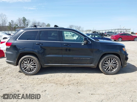 2018 Jeep Grand Cherokee Summit with VIN 1C4RJEJG2JC392847, listed as a IAAI auction lot 41751452 with 136,793 mi miles and . Bid and sale history available at DreamBid. Image 13.