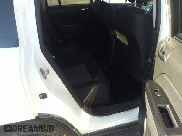 2014 Jeep Compass Sport with VIN 1C4NJCBB7ED508470, listed as a IAAI auction lot 41760536 with 133,628 mi miles and . Bid and sale history available at DreamBid. Image 8.