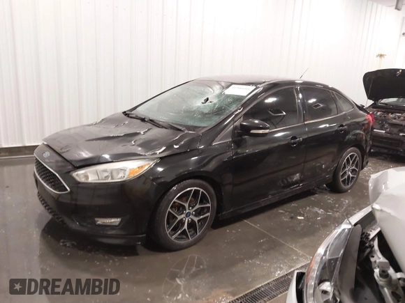 2015 Ford Focus SE с VIN 1FADP3F27FL357180, выставлен на аукционе IAAI как лот 41906601 с пробегом 70 998 миль миль и . История ставок и продаж доступна на DreamBid. Изображение 18.