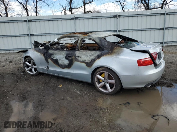 2009 Audi A5 with VIN WAUDK78T09A001754, listed as a Copart auction lot 50574115 with 0 mi miles and Salvage Title. Bid and sale history available at carsss.com. Image 2.