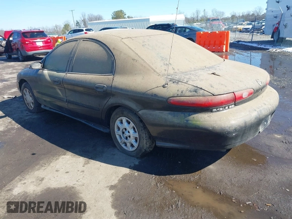 1997 Mercury Sable GS with VIN 1MELM50U7VA656293, listed as a IAAI auction lot 41651281 with 136,024 mi miles and . Bid and sale history available at DreamBid. Image 3.