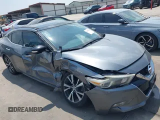 2016 Nissan Maxima SV z VIN 1N4AA6AP7GC380436, wystawiony jako IAAI lot #41947854 z przebiegiem 90 658 mil mil oraz . Historia ofert i sprzedaży dostępna na DreamBid. Obrazek 1.