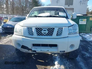 2012 Nissan Titan SV with VIN 1N6BA0EJ0CN309933, listed as a IAAI auction lot 41472091 with 147,635 mi miles. Bid and sale history available at carsss.com. Image 12.