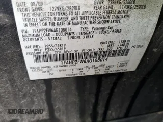 2010 Ford Taurus Limited z VIN 1FAHP2FW6AG108014, wystawiony jako Copart lot #58027455 z przebiegiem 229 871 mil mil oraz Szkoda całkowita • Salvage title. Historia ofert i sprzedaży dostępna na DreamBid. Obrazek 12.