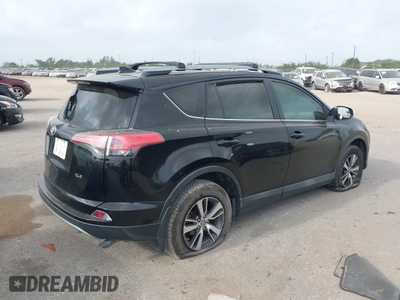 2017 Toyota RAV4 XLE with VIN 2T3WFREVXHW352608, listed as a IAAI auction lot 41921190 with 157,608 mi miles. Bid and sale history available at carsss.com. Image 4.