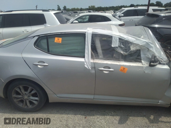 2013 Kia Optima LX z VIN 5XXGM4A73DG094160, wystawiony jako IAAI lot #41523337 z przebiegiem Nie podano mil oraz . Historia ofert i sprzedaży dostępna na DreamBid. Obrazek 12.