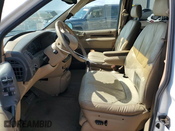1998 Chrysler Town & Country LXi with VIN 1C4GP64L2WB637437, listed as a Copart auction lot 70504424 with 82,972 mi miles and Salvage Title. Bid and sale history available at carsss.com. Image 7.