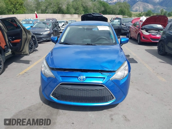 2019 Toyota Yaris L with VIN 3MYDLBYV2KY520621, listed as a IAAI auction lot 42278402 with 57,118 mi miles and . Bid and sale history available at DreamBid. Image 12.