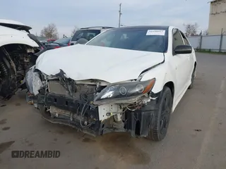 2007 Toyota Camry CE with VIN 4T1BE46K17U607386, listed as a IAAI auction lot 41698012 with 212,639 mi miles and . Bid and sale history available at DreamBid. Image 2.