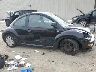 1999 Volkswagen Beetle GLS with VIN 3VWCC21C6XM401937, listed as a Copart auction lot 41978455 with 223,461 mi miles and Salvage title. Bid and sale history available at DreamBid. Image 4.