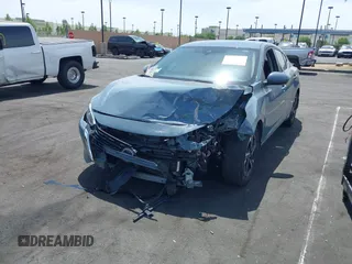 2024 Nissan Sentra SV with VIN 3N1AB8CV8RY300525, listed as a IAAI auction lot 42232919 with 19,837 mi miles and . Bid and sale history available at DreamBid. Image 6.