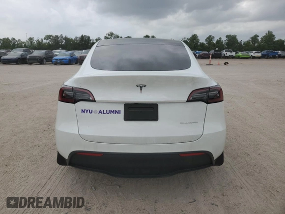 2023 Tesla Model Y Long Range z VIN 7SAYGDEE0PF802511, wystawiony jako Copart lot #54959415 z przebiegiem 12 902 mil mil oraz Szkoda całkowita • Salvage title. Historia ofert i sprzedaży dostępna na DreamBid. Obrazek 6.