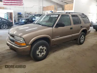 2004 Chevrolet Blazer LS z VIN 1GNDT13X24K161216, wystawiony jako Copart lot #56031935 z przebiegiem 146 267 mil mil oraz Szkoda całkowita • Salvage title. Historia ofert i sprzedaży dostępna na DreamBid. Obrazek 1.