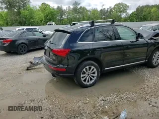 2014 Audi Q5 Premium z VIN WA1CFAFP3EA114642, wystawiony jako Copart lot #51740265 z przebiegiem 129 196 mil mil oraz Szkoda całkowita • Salvage title. Historia ofert i sprzedaży dostępna na DreamBid. Obrazek 11.