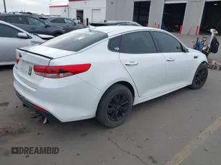2017 Kia Optima LX with VIN 5XXGT4L32HG171992, listed as a IAAI auction lot 41477494 with 119,415 mi miles. Bid and sale history available at carsss.com. Image 4.