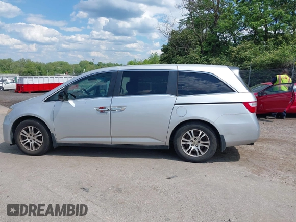 2012 Honda Odyssey EX-L with VIN 5FNRL5H67CB139701, listed as a IAAI auction lot 42233283 with 147,143 mi miles and . Bid and sale history available at DreamBid. Image 15.