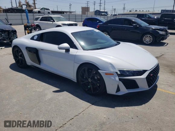 2023 Audi R8 performance quattro z VIN WUACEAFX9P7900103, wystawiony jako Copart lot #57456835 z przebiegiem 5 220 mil mil oraz Szkoda całkowita • Salvage title. Historia ofert i sprzedaży dostępna na DreamBid. Obrazek 4.
