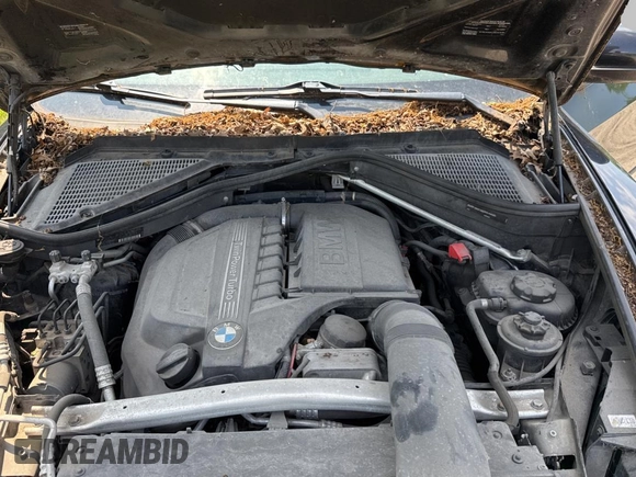2013 BMW X5 xDrive35i z VIN 5UXZV4C53D0B00978, wystawiony jako Copart lot #56523455 z przebiegiem 170 241 mil mil oraz Czysty tytuł • Clean title. Historia ofert i sprzedaży dostępna na DreamBid. Obrazek 7.