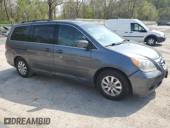 2010 Honda Odyssey EX with VIN 5FNRL3H48AB011905, listed as a Copart auction lot 54990195 with 236,506 mi miles and Clean Title. Bid and sale history available at DreamBid. Image 4.